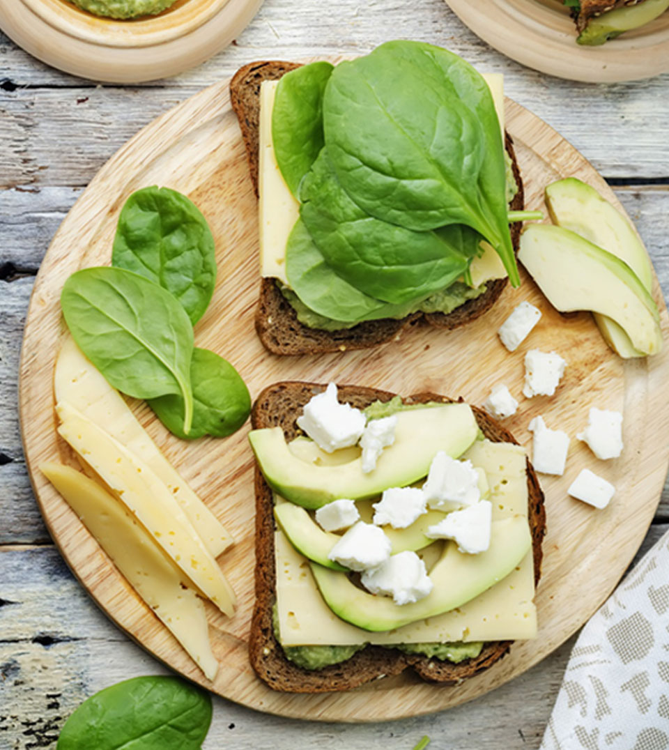 Pesto sandwich with avocado and cheese